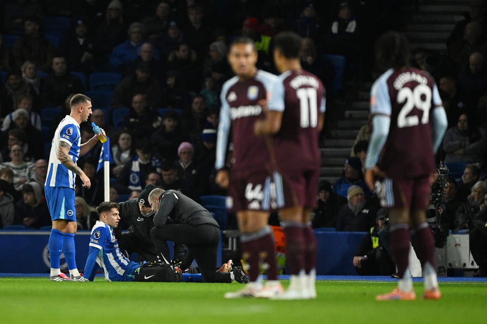 Stefanos Tzimas of Brighton & Hove Albion receives medical treatment during the Premier League match between Brighton & Hove Albion and Aston Villa at Amex Stadium on December 03, 2025 in Brighton, England. (Photo by Mike Hewitt/Getty Images)