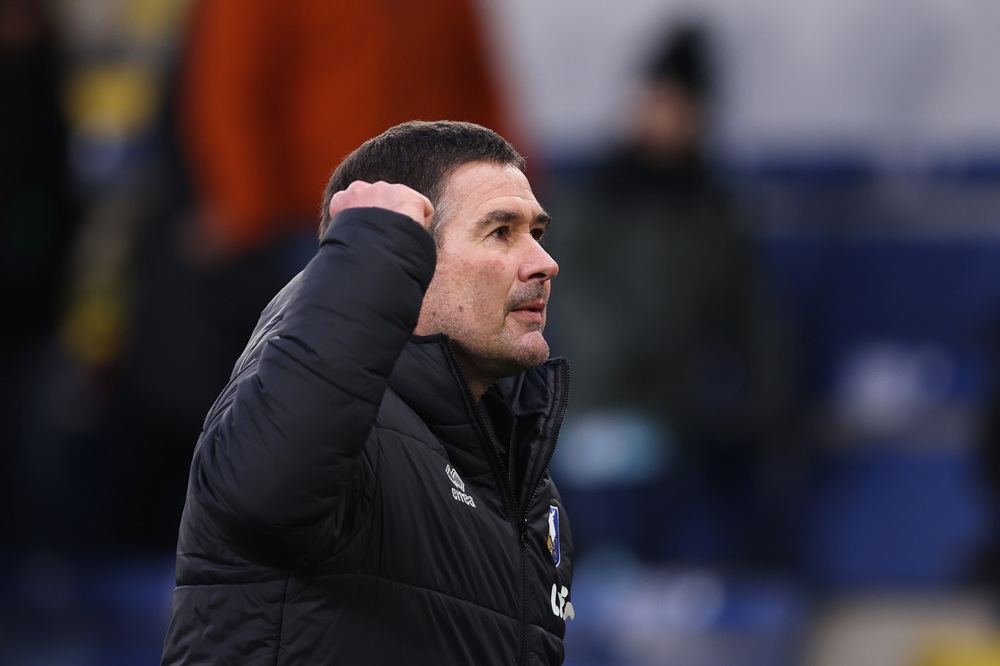 Nigel Clough, Manager of Mansfield Town, celebrates the teams victory in the Emirates FA Cup Fourth Round match between Burnley and Mansfield Town at Turf Moor on February 14, 2026 in Burnley, England. (Photo by George Wood/Getty Images)