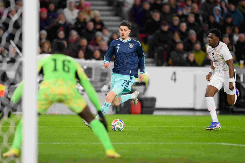 STUTTGART, GERMANY - MARCH 30: Kai Havertz of Germany challenges Derrick Koehn of Ghana during the international friendly match between Germany and Ghana at MHP Arena on March 30, 2026 in Stuttgart, Germany. (Photo by Christian Kaspar-Bartke/Getty Images)