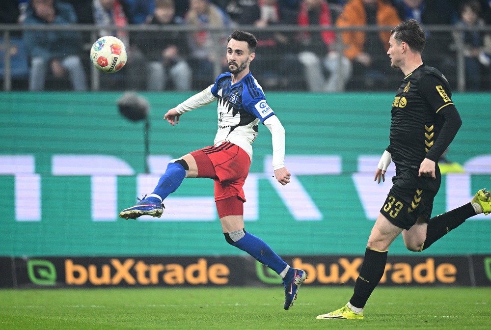 Arsenal loanee scores audacious effort & celebrates like Saka 1 Fabio Vieira of Hamburger SV scores his team's first goal under pressure from Rav van den Berg of 1. FC Koln during the Bundesliga match between Ha...