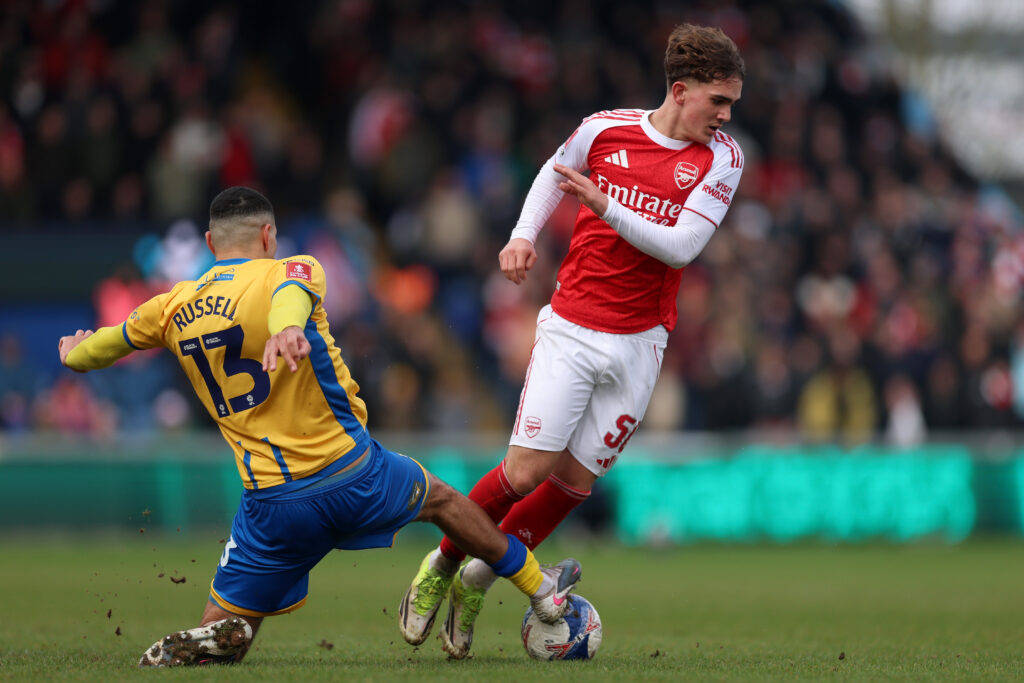 MANSFIELD, ENGLAND - MARCH 07: Max Dowman of Arsenal is challenged by Jon Russell of Mansfield Town during the Emirates FA Cup Fifth Round match between Mansfield Town and Arsenal at One Call Stadium on March 07, 2026 in Mansfield, England. (Photo by Julian Finney/Getty Images)