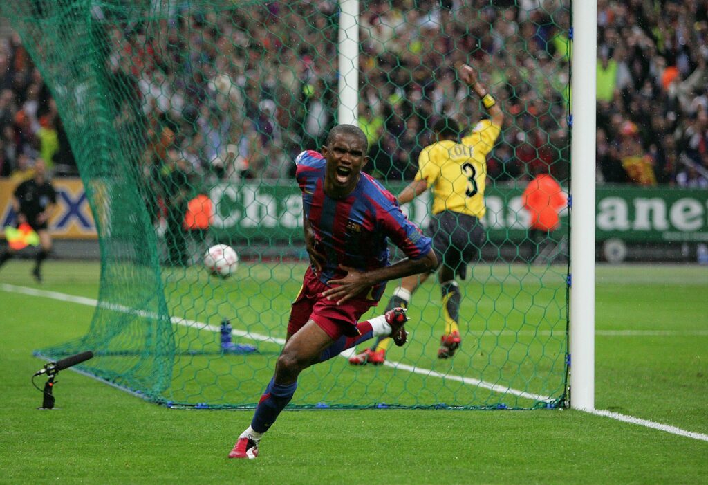 PARIS - MAY 17: Samuel Eto?o of Barcelona celebrates scoring the equalising goal during the UEFA Champions League Final between Arsenal and Barcelona at the Stade de France on May 17, 2006 in Paris, France. (Photo by Mike Hewitt/Getty Images)