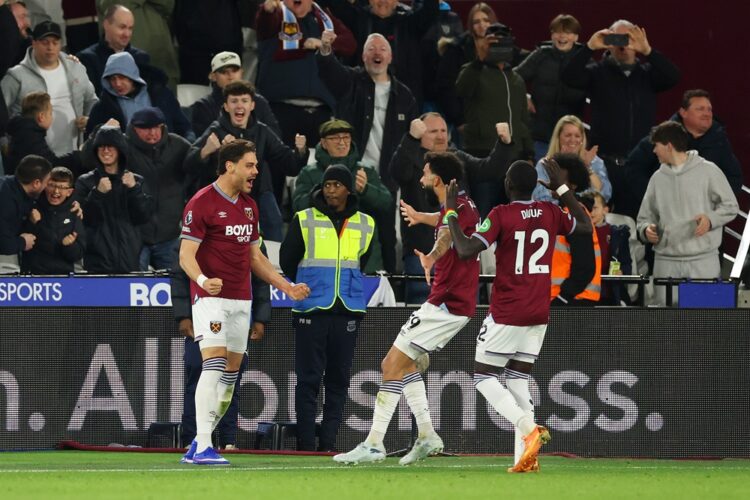 Konstantinos Mavropanos of West Ham United celebrates scoring his team's first goal with teammates Pablo and El Hadji Malick Diouf during the Premi...