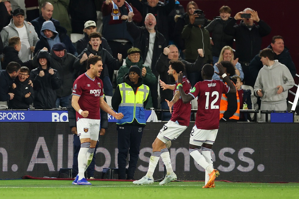 Konstantinos Mavropanos of West Ham United celebrates scoring his team's first goal with teammates Pablo and El Hadji Malick Diouf during the Premi...