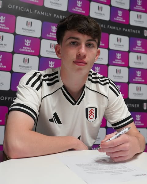 Dan Casey signing for Fulham (Photo via Fulham on Instagram)