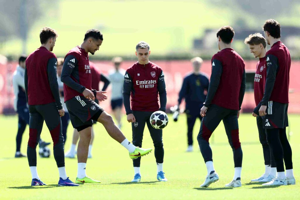 LONDON COLNEY, ENGLAND - APRIL 06: William Saliba of Arsenal passes the ball during a Training Session at Sobha Realty Training Centre on April 06, 2026 in London Colney, England. (Photo by James Fearn/Getty Images)