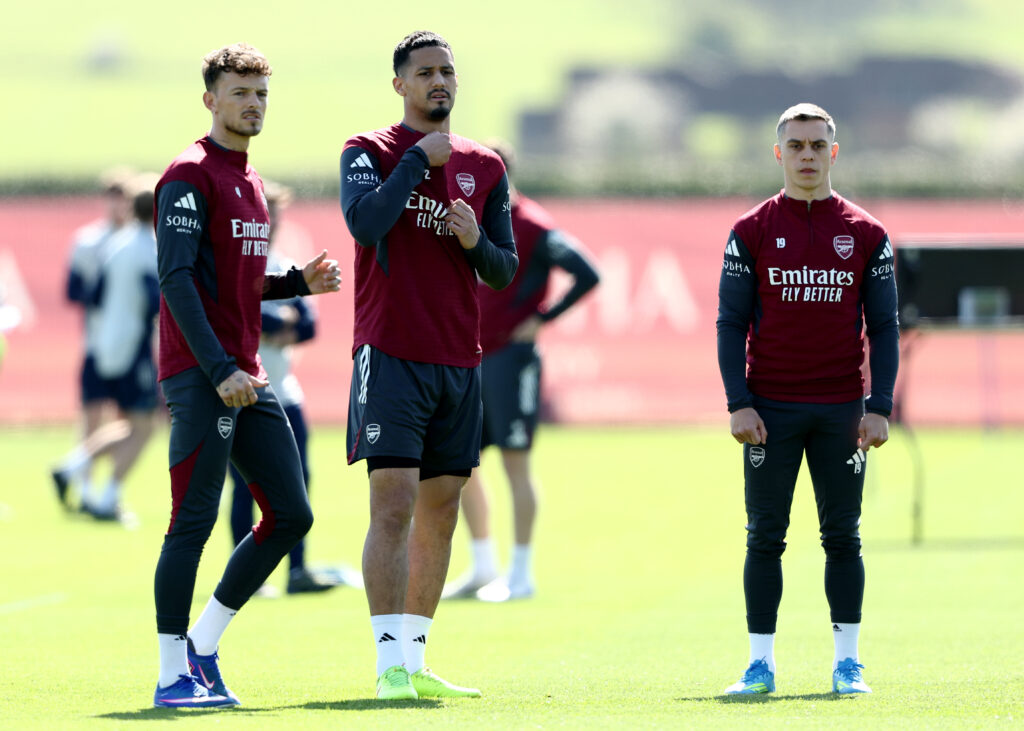 LONDON COLNEY, ENGLAND - APRIL 06: Ben White, William Saliba and Leandro Trossard of Arsenal look on during a Training Session at Sobha Realty Training Centre on April 06, 2026 in London Colney, England. (Photo by James Fearn/Getty Images)