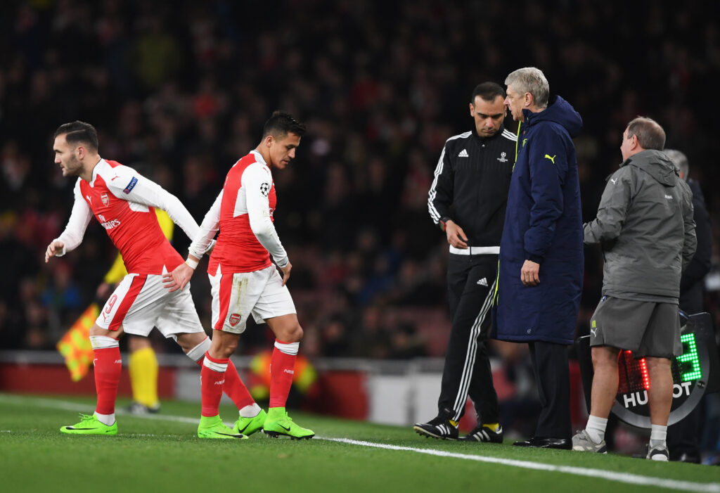 LONDON, ENGLAND - MARCH 07: Alexis Sanchez of Arsenal is substituted for Lucas Perez of Arsenal during the UEFA Champions League Round of 16 second leg match between Arsenal FC and FC Bayern Muenchen at Emirates Stadium on March 7, 2017 in London, United Kingdom. (Photo by Shaun Botterill/Getty Images)