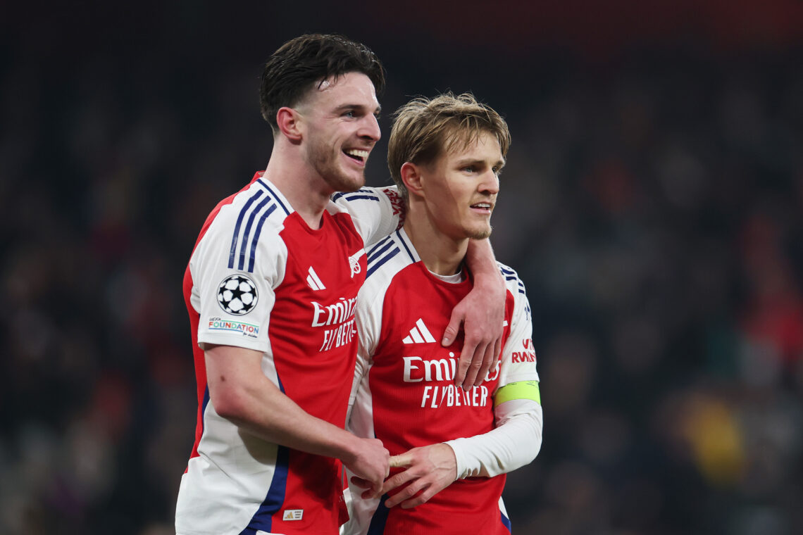 Declan Rice in an Arsenal kit with his arm around Martin Odegaard's shoulder