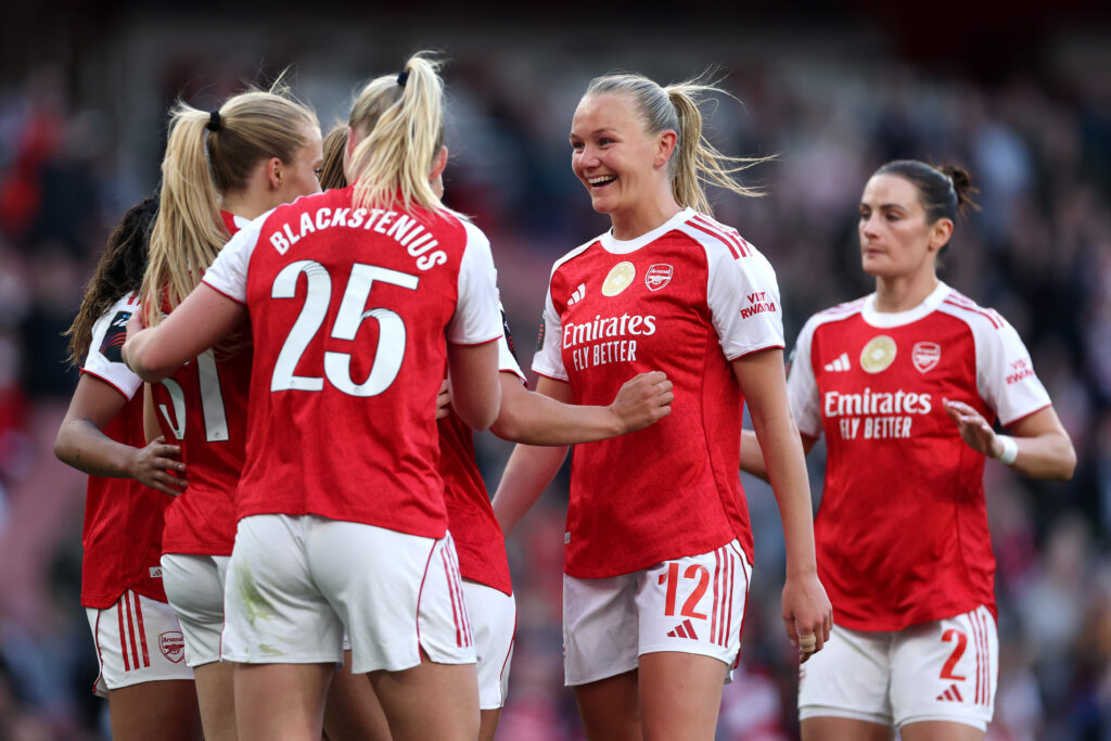 Smilla Holmberg of Arsenal celebrates scoring her team's second goal with teeammates Frida Maanum and Stina Blackstenius during the Barclays Women's Super League match between Arsenal and Leicester City 