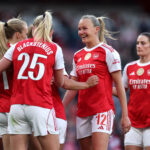 Smilla Holmberg of Arsenal celebrates scoring her team's second goal with teeammates Frida Maanum and Stina Blackstenius during the Barclays Women's Super League match between Arsenal and Leicester City
