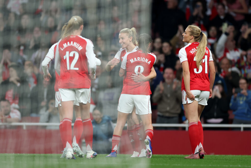Leah Williamson celebrates with her Arsenal teammates after scoring