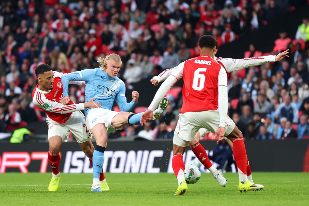Arsenal injury update: Gabriel's knee 3 LONDON, ENGLAND - MARCH 22: Erling Haaland of Manchester City shoots whilst under pressure from William Saliba of Arsenal during the Carabao Cup Final match between Arsenal and Manchester City at Wembley Stadium on March 22, 2026 in London, England. (Photo by Julian Finney/Getty Images)