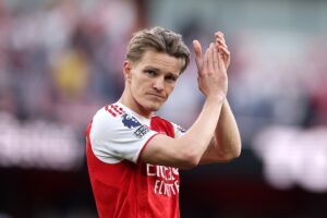 Martin Odegaard of Arsenal celebrates victory after the Premier League match between Arsenal and Newcastle United at Emirates Stadium on April 25, 2026 in London, England. (Photo by Richard Heathcote/Getty Images)