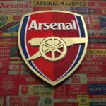 LONDON, ENGLAND - OCTOBER 04: The Arsenal badge is seen on the outside of the stadium prior to the Premier League match between Arsenal and West Ham United at Emirates Stadium on October 04, 2025 in London, England. (Photo by Julian Finney/Getty Images)