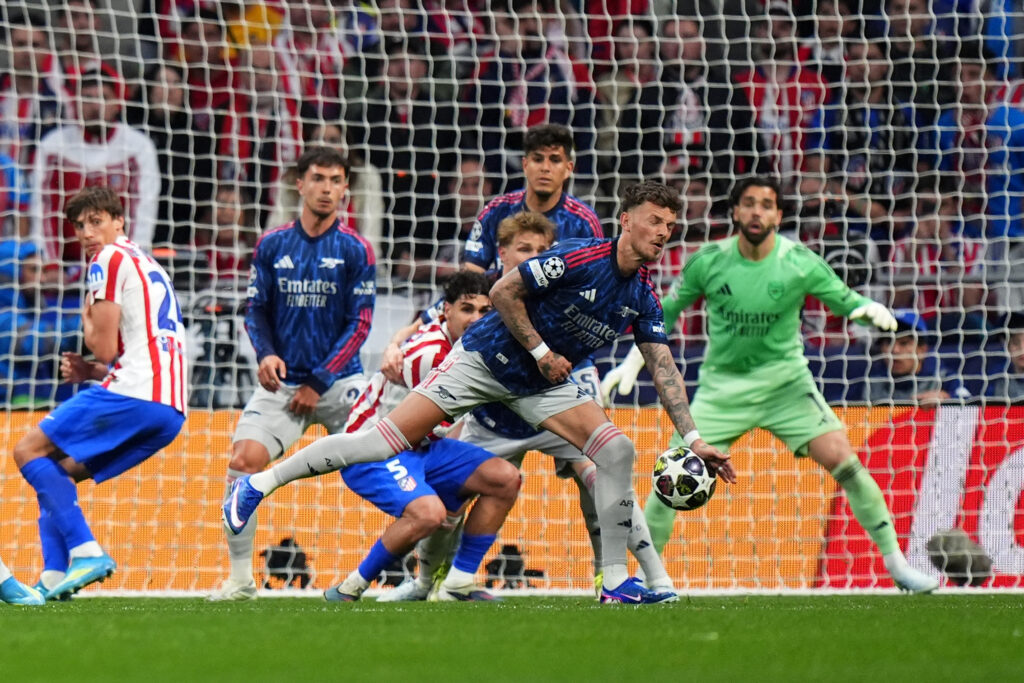 The ball strikes Ben White's hand as Arsenal play Atletico Madrid