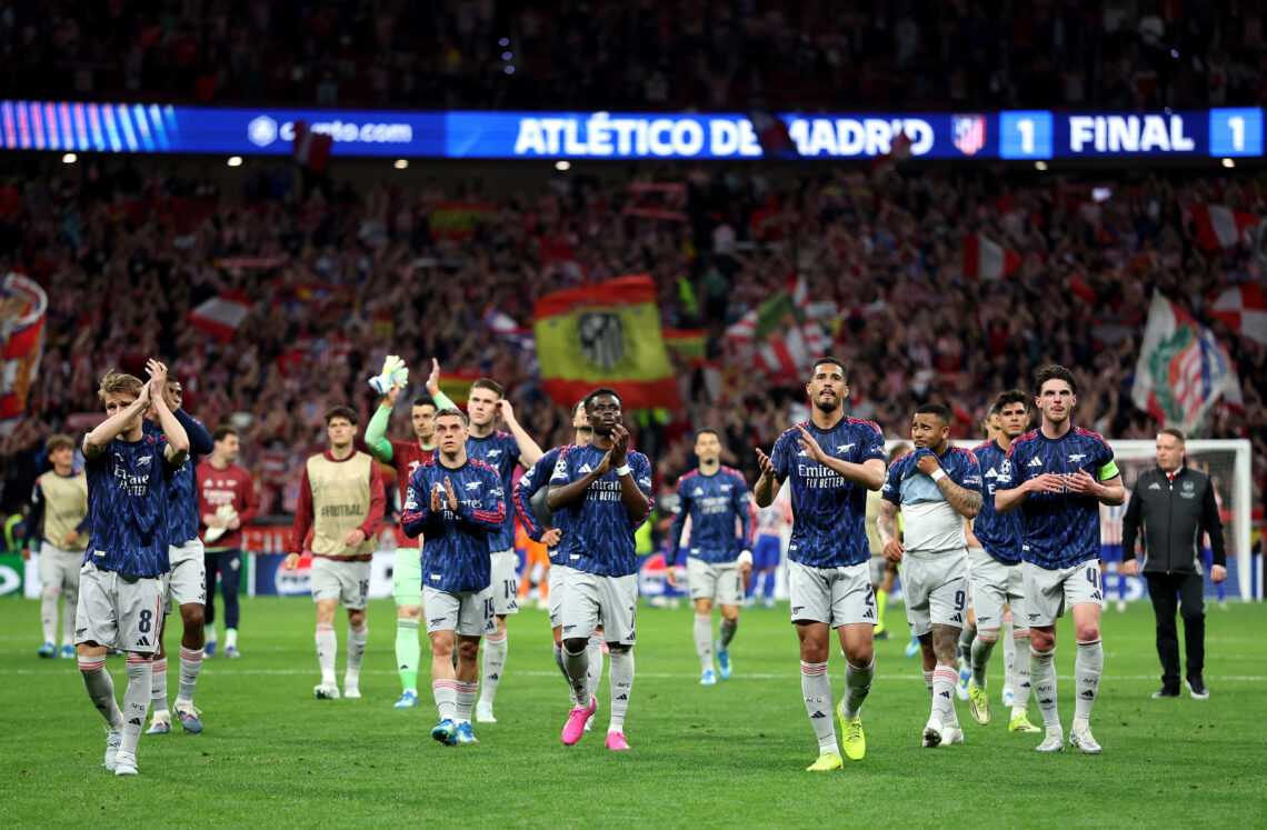 Arsenal players applaud Arsenal fans after their 1-1 draw in Madrid against Atletico