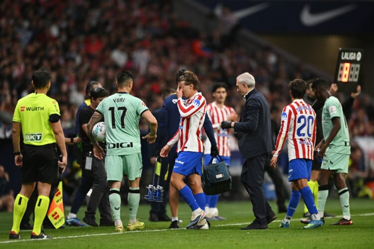 Pablo Barrios of Atletico de Madrid reacts after suffering an injury and subsequently being substituted off during the LaLiga EA Sports match betwe...