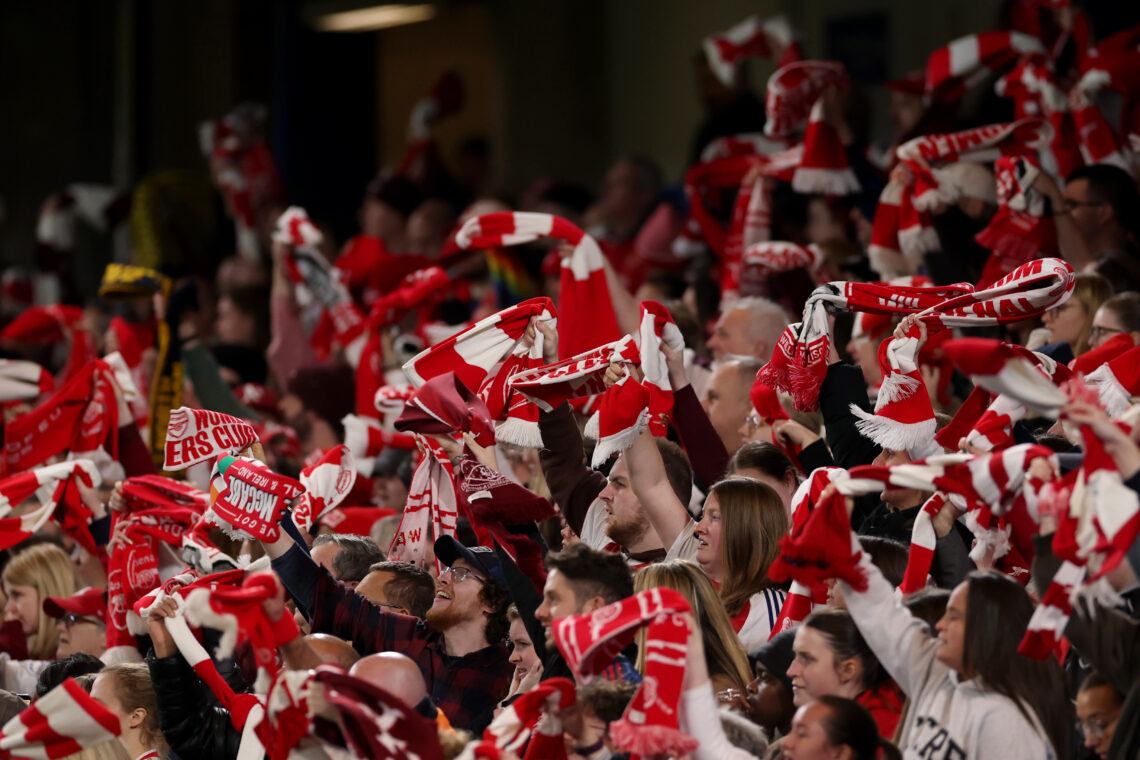 LONDON, ENGLAND - APRIL 01: Fans of Arsenal wave their scarves to show support for their team during the UEFA Women's Champions League 2025/26 Quar...