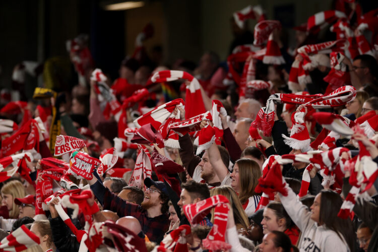 LONDON, ENGLAND - APRIL 01: Fans of Arsenal wave their scarves to show support for their team during the UEFA Women's Champions League 2025/26 Quar...