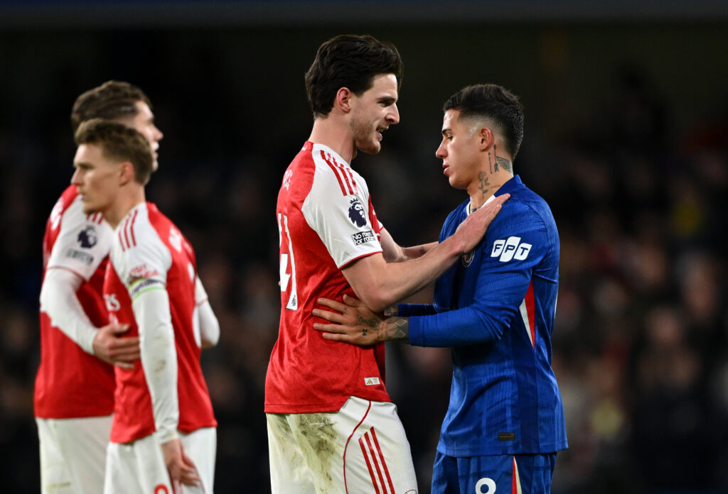 LONDON, ENGLAND - NOVEMBER 30: Declan Rice of Arsenal and Enzo Fernandez of Chelsea embrace after the Premier League match between Chelsea and Arsenal at Stamford Bridge on November 30, 2025 in London, England. (Photo by Mike Hewitt/Getty Images)