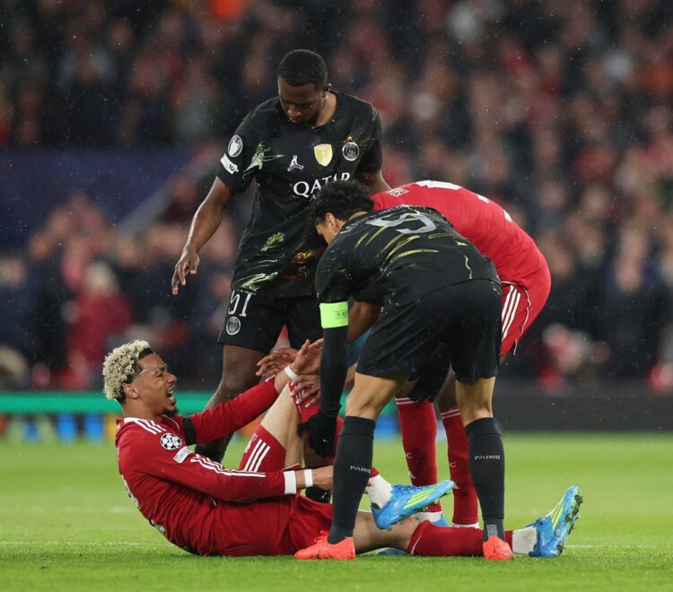 Hugo Ekitike of Liverpool holds his ankle as he appears to be injured during the UEFA Champions League 2025/26 Quarter-Final Second Leg match betwe...