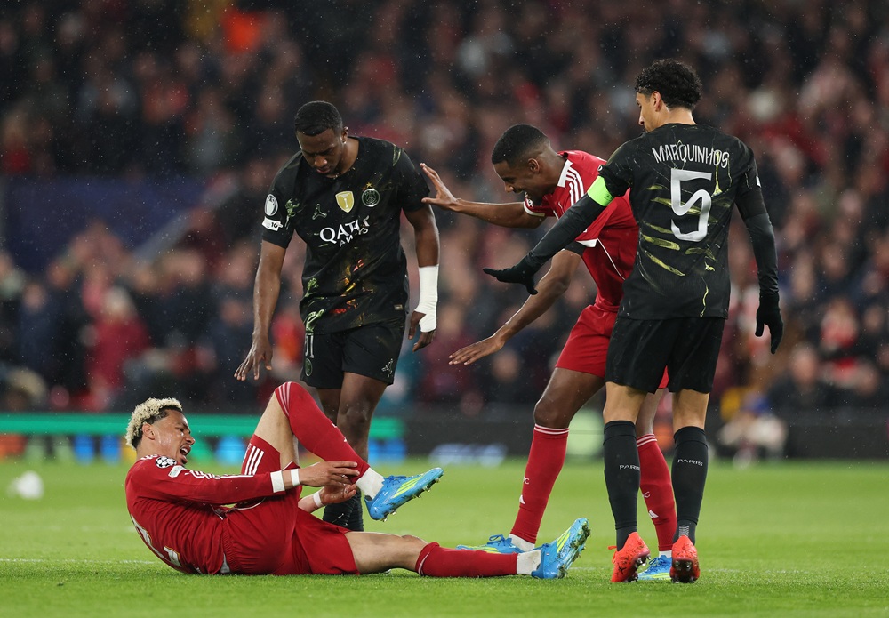 Hugo Ekitike of Liverpool holds his ankle as he appears to be injured during the UEFA Champions League 2025/26 Quarter-Final Second Leg match between Liverpool FC and Paris Saint-Germain FC at Anfield on April 14, 2026 in Liverpool, England. (Photo by Michael Steele/Getty Images)