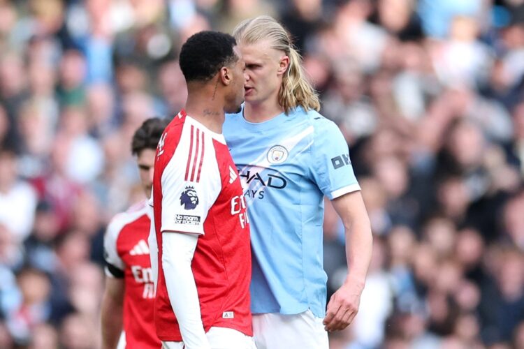 Gabriel of Arsenal clashes with Erling Haaland of Manchester City during the Premier League match between Manchester City and Arsenal at Etihad Sta...