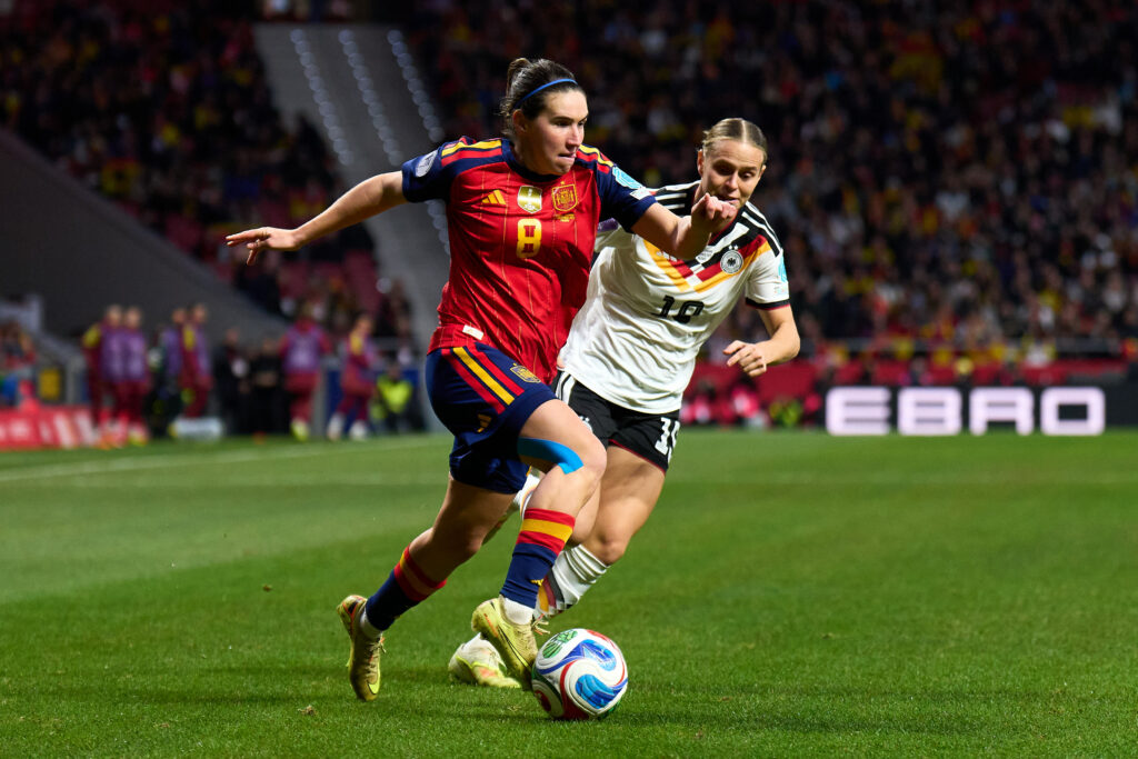MADRID, SPAIN - DECEMBER 02: Mariona Caldentey of Spain is challenged by Klara Buhl of Germany during the UEFA Women's Nations League 2025 final second leg match between Spain and Germany at Estadio Metropolitano on December 02, 2025 in Madrid, Spain. (Photo by Angel Martinez/Getty Images)