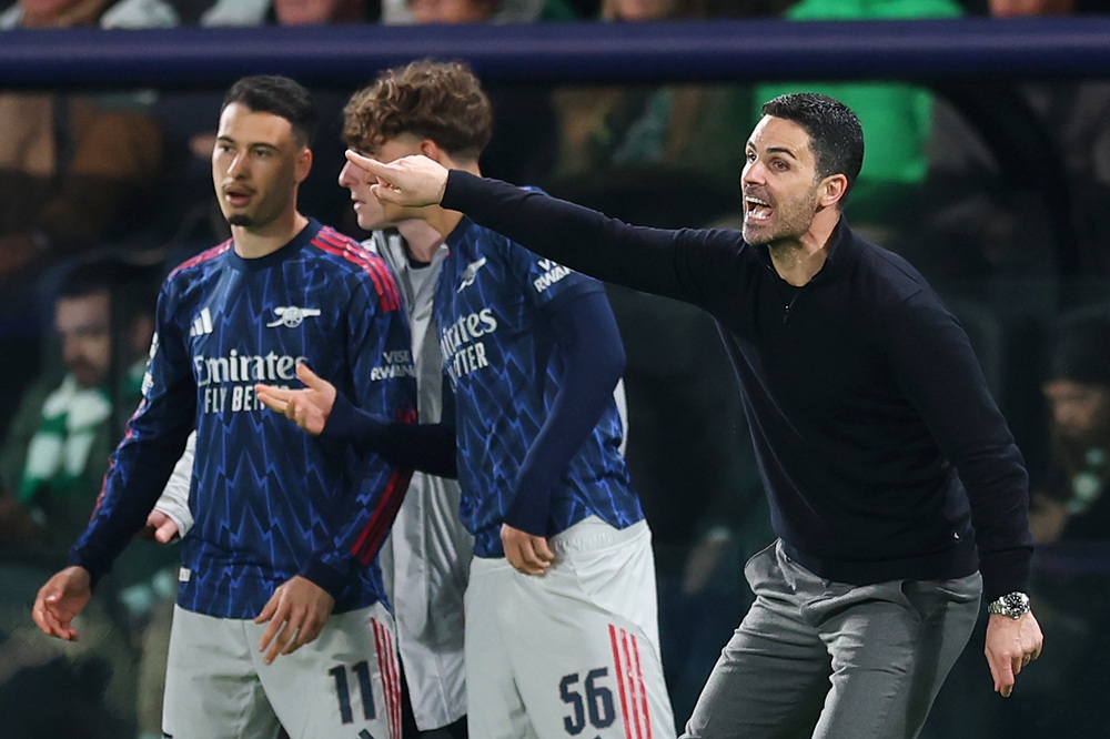 Mikel Arteta, Manager of Arsenal, reacts during the UEFA Champions League 2025/26 Quarter-Final First Leg match between Sporting Clube de Portugal ...