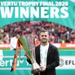 Jack Wilshere, Manager of Luton Town, poses for a photo with the Vertu Trophy after the team's victory in the Vertu Trophy Final match between Stockport County and Luton Town at Wembley Stadium on April 12, 2026 in London, England. (Photo by James Fearn/Getty Images)
