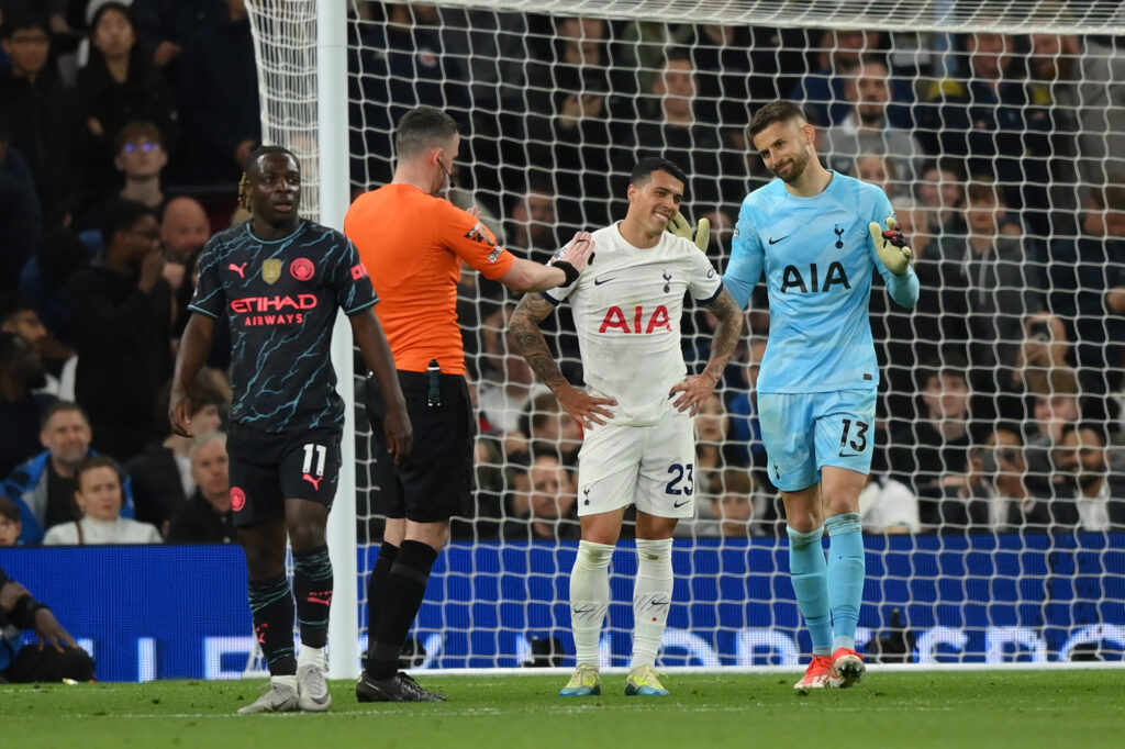 LONDON, ENGLAND - MAY 14: Pedro Porro and Guglielmo Vicario of Tottenham Hotspur react towards Referee Chris Kavanagh after Manchester City are awarded a penalty kick after Jeremy Doku of Manchester City is fouled by Pedro Porro during the Premier League match between Tottenham Hotspur and Manchester City at Tottenham Hotspur Stadium on May 14, 2024 in London, England. (Photo by Justin Setterfield/Getty Images)