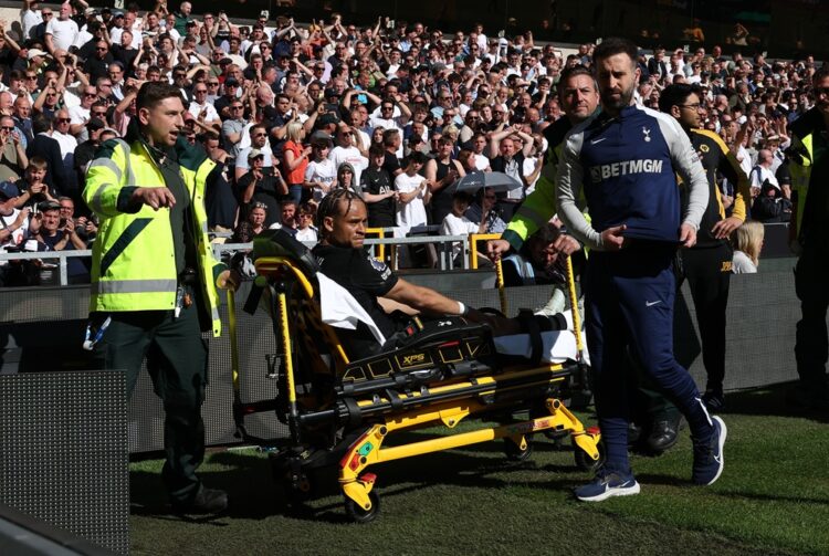 Xavi Simons of Tottenham Hotspur leaves the pitch on a stretcher during the Premier League match between Wolverhampton Wanderers and Tottenham Hots...