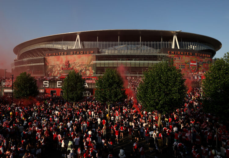 LONDON, ENGLAND - MAY 24: Arsenal fans celebrate at the Emirates Stadium on May 24, 2026 in London, England. Arsenal have won their first Premier L...