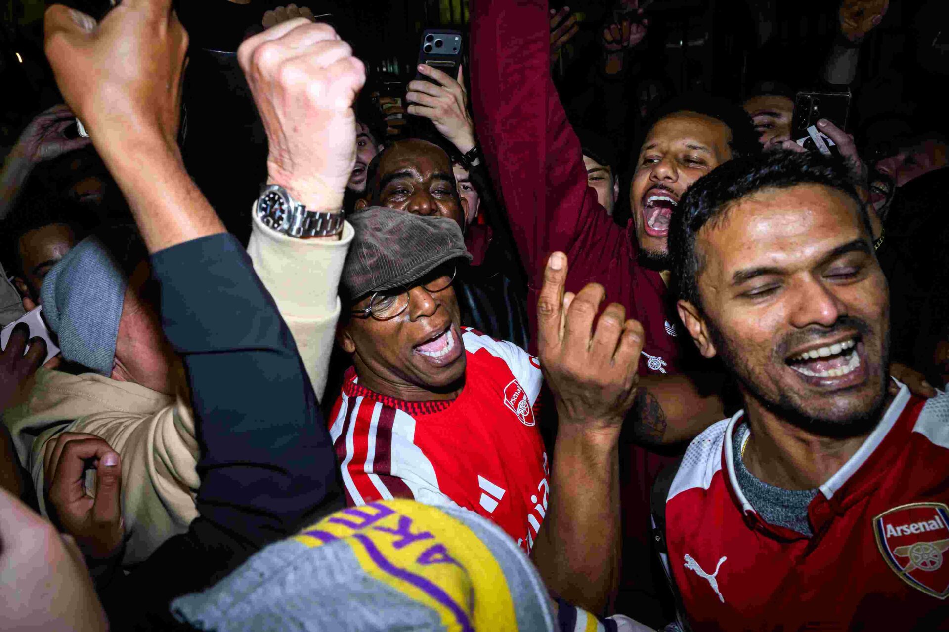 LONDON, ENGLAND - MAY 19: English media personality and former Arsenal footballer Ian Wright celebrates with supporters at Emirates Stadium as Arsenal take the Premier League title on May 19, 2026 in London, England. Arsenal have won their first Premier League title in 22 years after Manchester City drew 1-1 with Bournemouth. (Photo by Leon Neal/Getty Images)