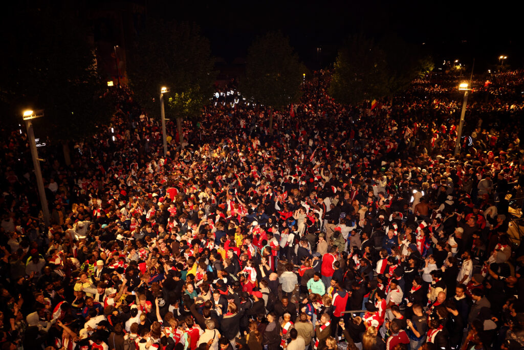 LONDON, ENGLAND - MAY 19: Arsenal fans celebrate winning the Premier League after Manchester City failed to win away to Bournemouth at Emirates Stadium on May 19, 2026 in London, England. (Photo by Julian Finney/Getty Images)