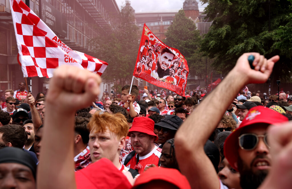 Arsenal parade: All the details, photos, video 8 ISLINGTON, ENGLAND - MAY 31: Fans of Arsenal celebrate on May 31, 2026 in Islington, England. Arsenal clinched their first Premier League title in 22 years earlier this month. (Photo by Alex Pantling/Getty Images)