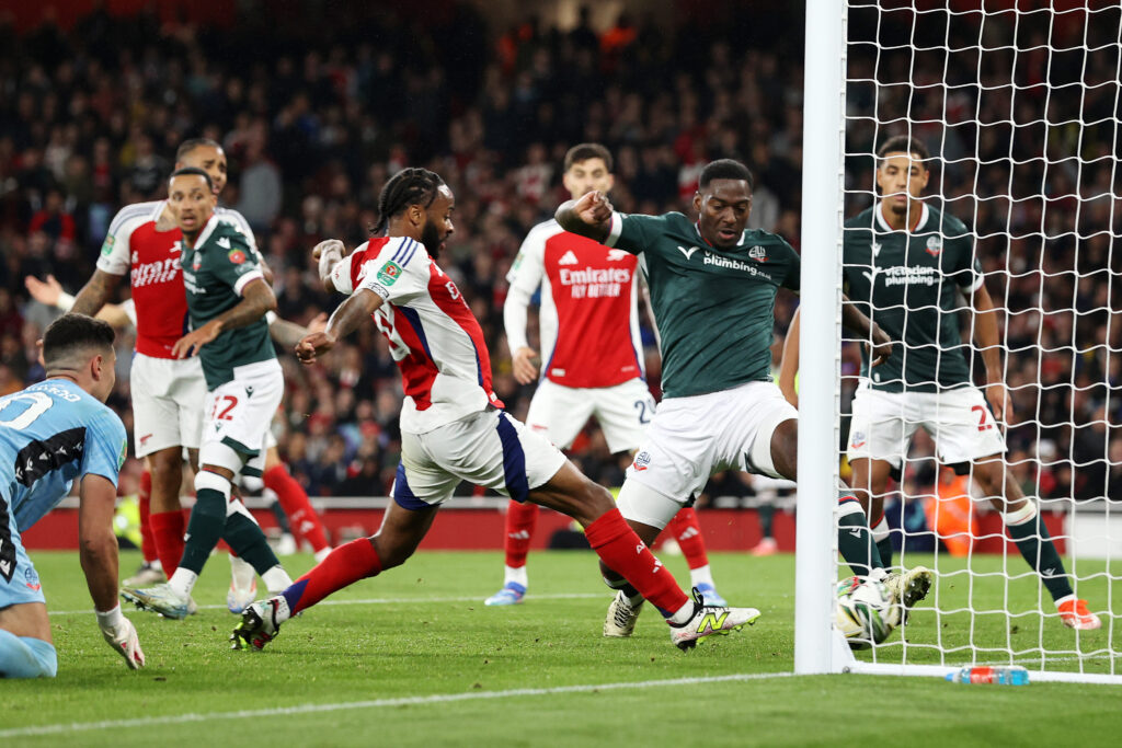 Raheem Sterling of Arsenal scores his team's fourth goal during the Carabao Cup Third Round match between Arsenal and Bolton Wanderers at Emirates Stadium on September 25, 2024 in London, England.