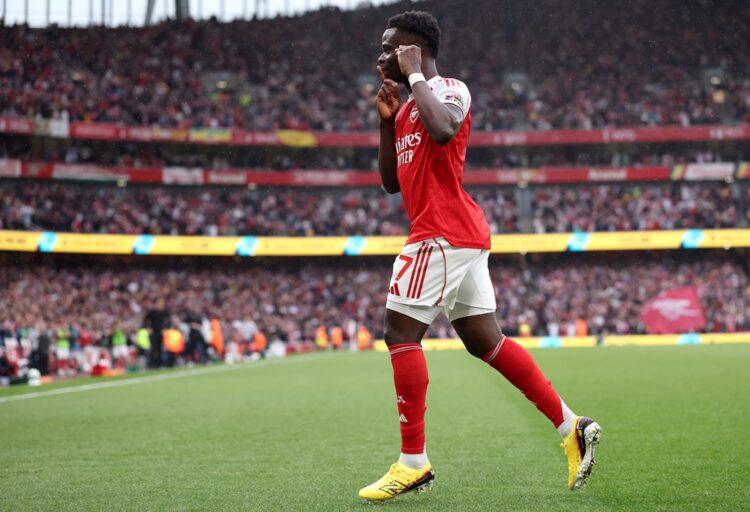 Bukayo Saka of Arsenal celebrates scoring his team's second goal during the Premier League match between Arsenal and Fulham at Emirates Stadium on ...