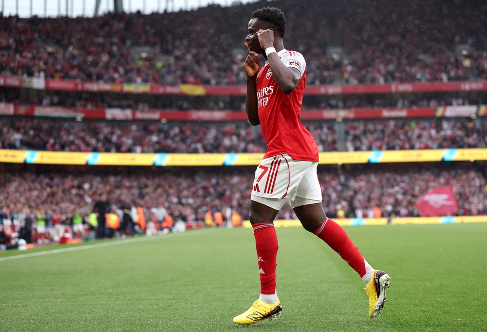 Bukayo Saka of Arsenal celebrates scoring his team's second goal during the Premier League match between Arsenal and Fulham at Emirates Stadium on ...