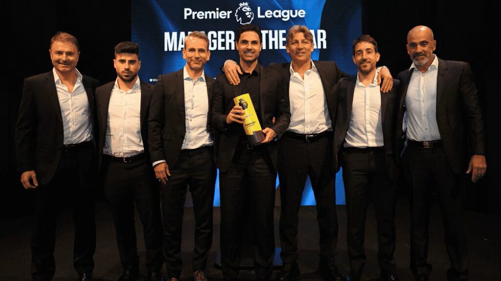 Mikel Arteta and his team with his Premier League Manager of the Season award