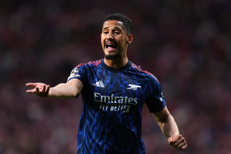 William Saliba of Arsenal reacts during the UEFA Champions League 2025/26 Semi Final First Leg match between Atletico de Madrid and Arsenal FC at M...