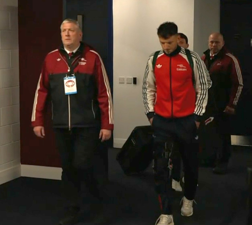 Ben White wearing a knee brace
