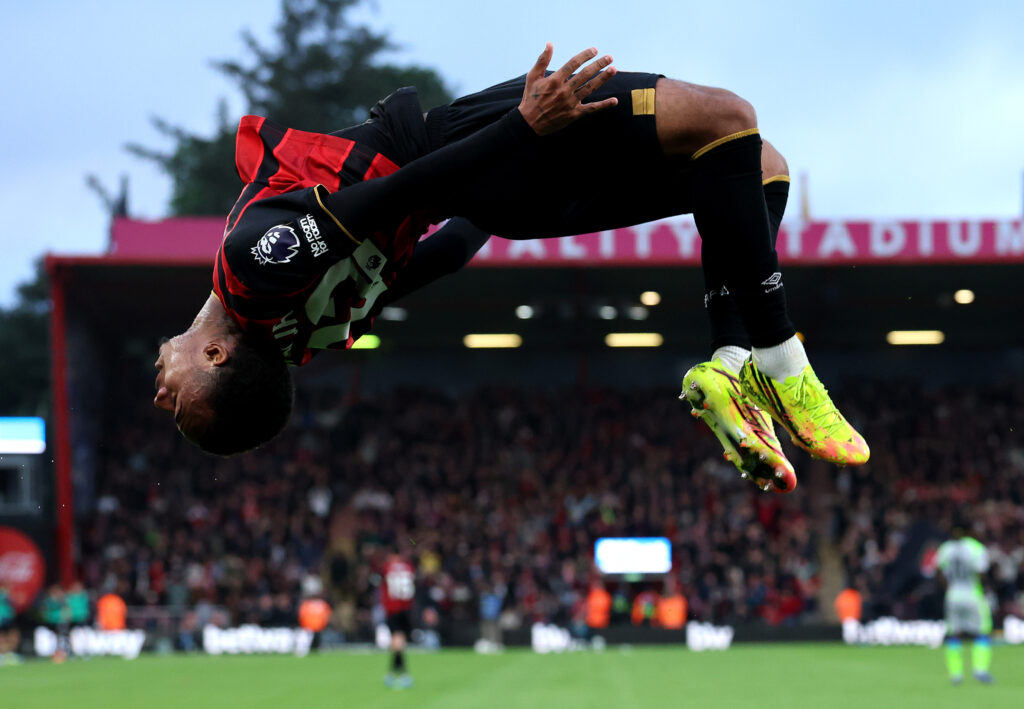 MAY 19: Eli Junior Kroupi of AFC Bournemouth performs a back flip as he celebrates scoring his team's first goal during the Premier League match between Bournemouth and Manchester City at Vitality Stadium on May 19, 2026 in Bournemouth, England.