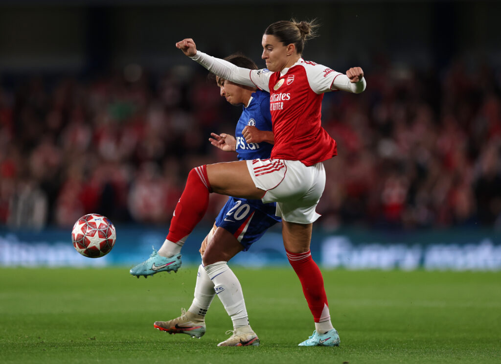 Steph Catley of Arsenal is challenged by Sam Kerr of Chelsea during the UEFA Women's Champions League 2025/26 Quarter-finals Second Leg match between Chelsea and Arsenal at Stamford Bridge on April 01, 2026 in London, England.