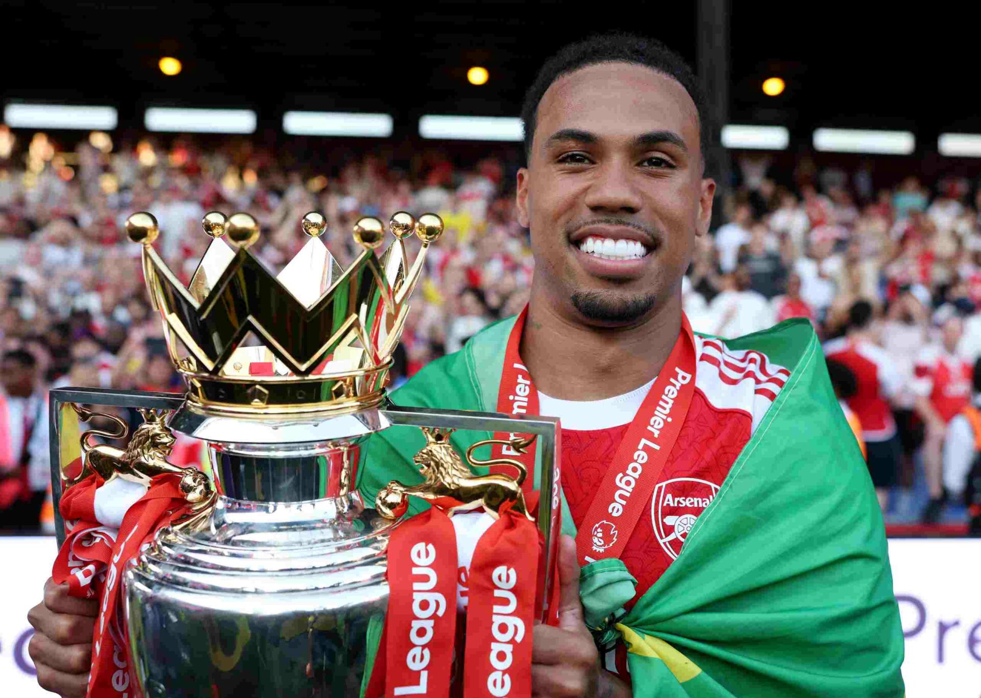 Best photos as Arsenal lift Premier League trophy 13 LONDON, ENGLAND - MAY 24: Gabriel of Arsenal pose for a photo with the Premier League trophy as players of Arsenal celebrate, as they are crowned the Champions of the Premier League for the 2025/26 Season, after the Premier League match between Crystal Palace and Arsenal at Selhurst Park on May 24, 2026 in London, England. (Photo by Justin Setterfield/Getty Images)
