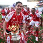 Mikel Arteta, Manager of Arsenal, celebrates with the Premier League trophy, as Arsenal are crowned the Champions of the Premier League for the 2025/26 Season, after the Premier League match between Crystal Palace and Arsenal at Selhurst Park on May 24, 2026 in London, England. (Photo by Michael Regan/Getty Images For Premier League)