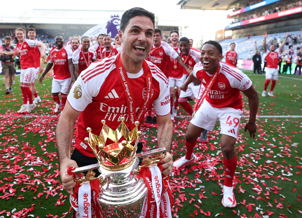 Mikel Arteta, Manager of Arsenal, celebrates with the Premier League trophy, as Arsenal are crowned the Champions of the Premier League for the 2025/26 Season, after the Premier League match between Crystal Palace and Arsenal at Selhurst Park on May 24, 2026 in London, England. (Photo by Michael Regan/Getty Images For Premier League)