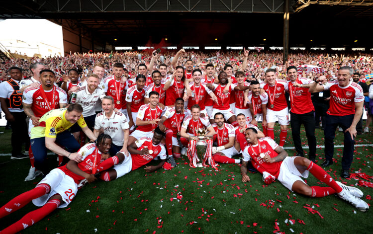 LONDON, ENGLAND - MAY 24: Players of Arsenal celebrate with the Premier League trophy, as Arsenal are crowned the Champions of the Premier League f...