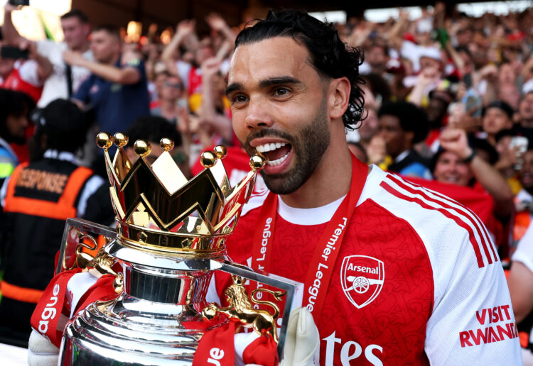 David Raya of Arsenal bites the Premier League trophy as Arsenal are crowned the Champions of the Premier League for the 2025/26 Season, after the ...